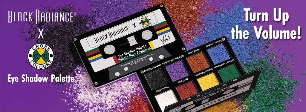 Black Radiance x Cross Colours Eye Shadow Palette shaped like a cassette tape, shown open with vibrant shades on a background of crushed pigments and the phrase 'Turn Up the Volume!'